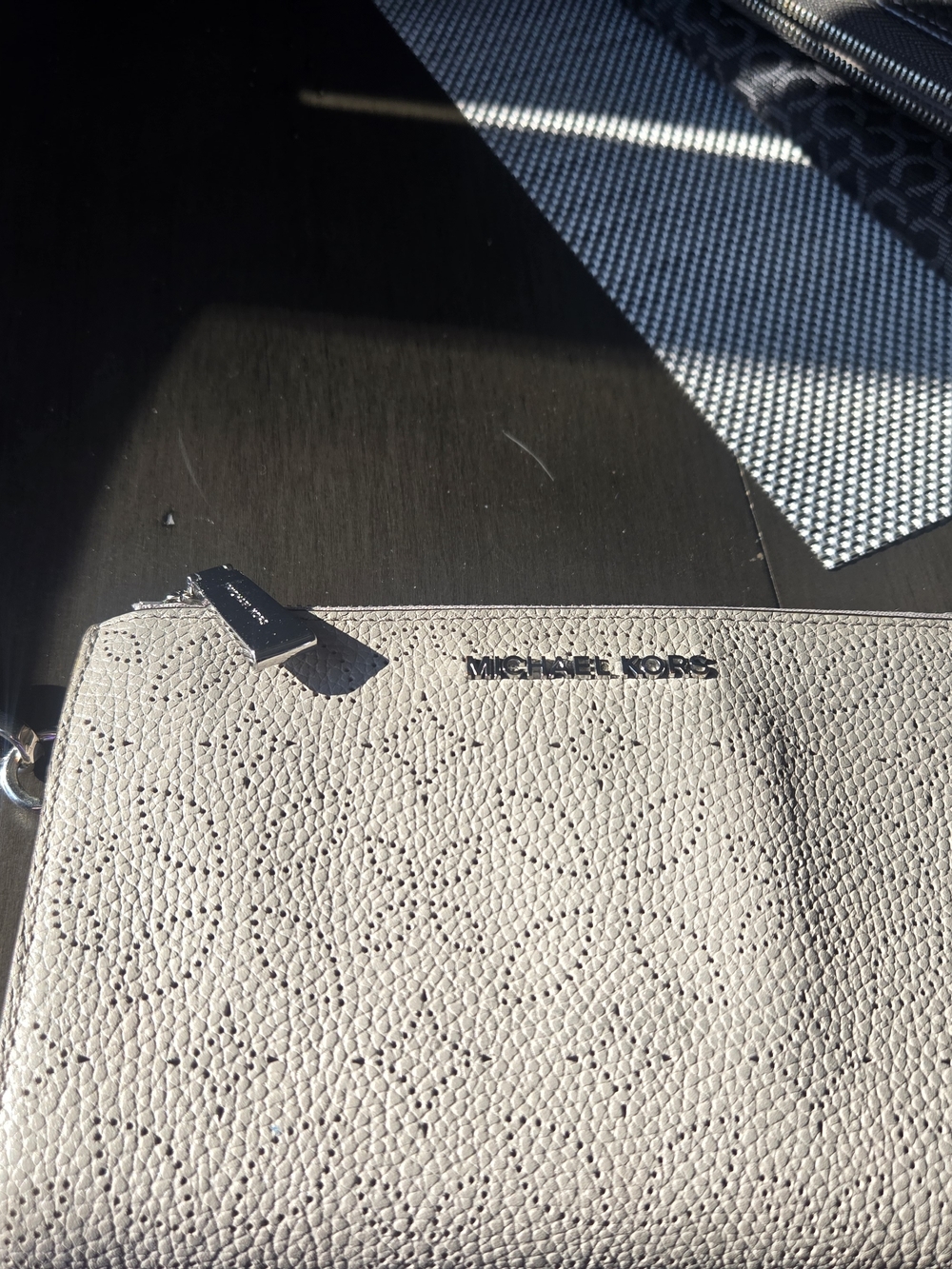 Michael Kors Pebbled Leather Wristlet in Light Beige